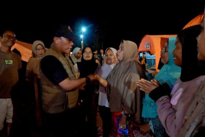 bupati_masinton_rayakan_malam_pergantian_tahun_bersama_pengungsi_di_tapteng