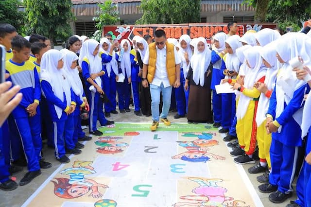 permainan_tradisional_ramaikan_peringatan_hari_anak_nasional_di_labura
