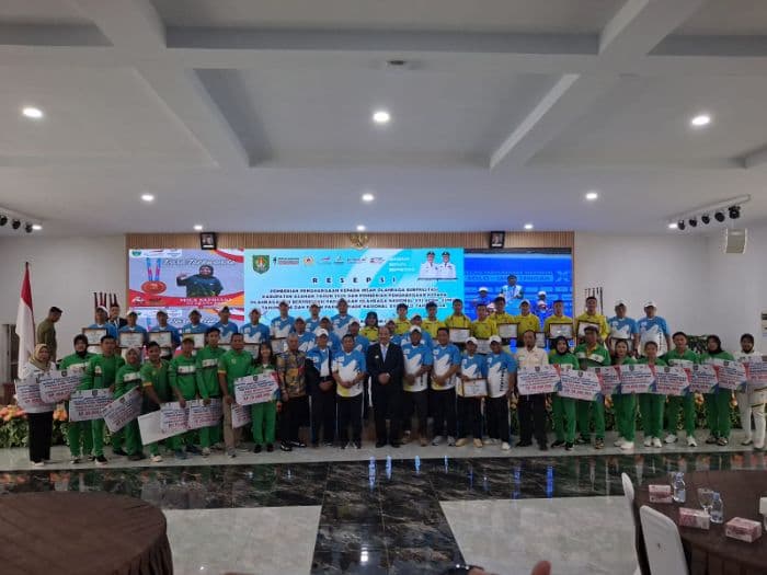 pemkab_asahan_salurkan_uang_bonus_rp21_miliar_untuk_atlet_ponpeparnas