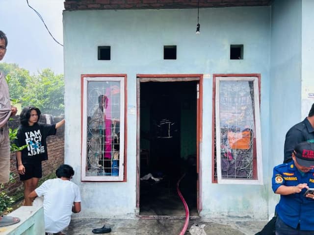 rumah_di_jalan_lapangan_bola_bawah_pematangsiantar_nyaris_terbakar_diduga_dari_tungku_kayu