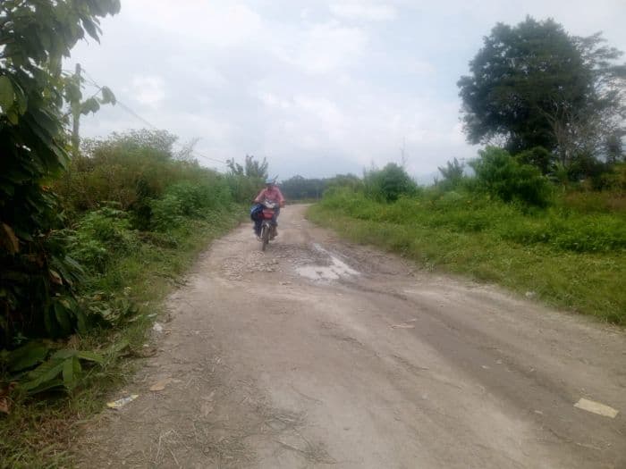 warga_patane_ii_toba_minta_perbaikan_jalan_rusak_segera_dilanjutkan
