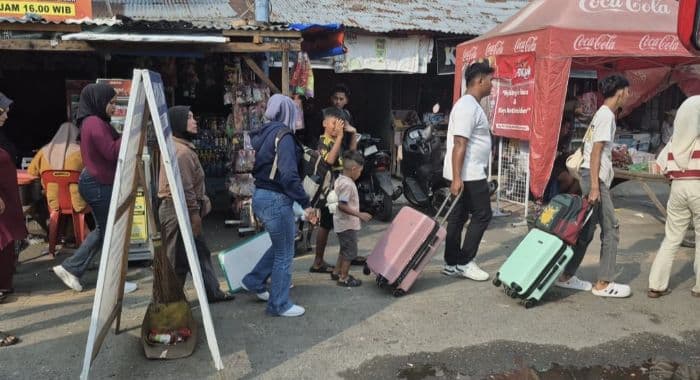 puncak_arus_balik_nataru_banyak_calon_penumpang_di_terminal_bus_binjai_kehabisan_tiket_