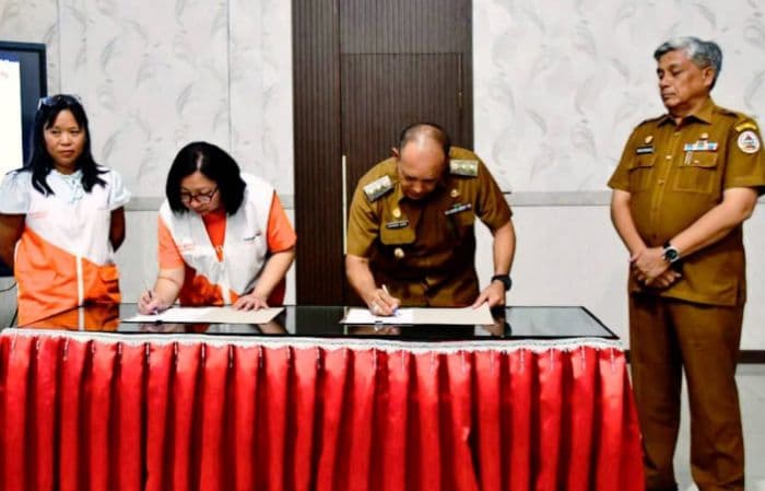 pemkab_tapteng_dan_yayasan_wahana_visi_indonesia_teken_mou_penanganan_pascabencana