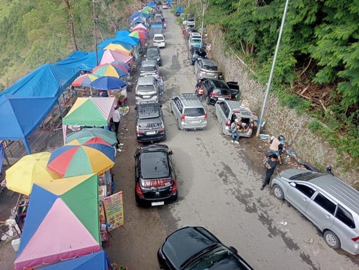 penghasilan_jukir_di_menara_pandang_tele_menurun_saat_libur_lebaran_2025