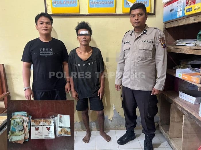 warga_pagaran_julu_serahkan_pelaku_pencurian_ke_polisi