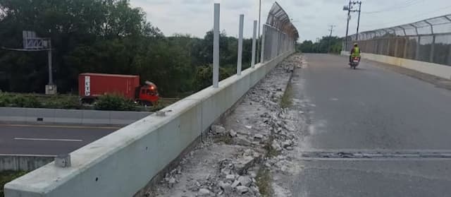 rayap_besi_kikis_pagar_jembatan_tol_belmera_dan_rusunawa_medan_labuhan