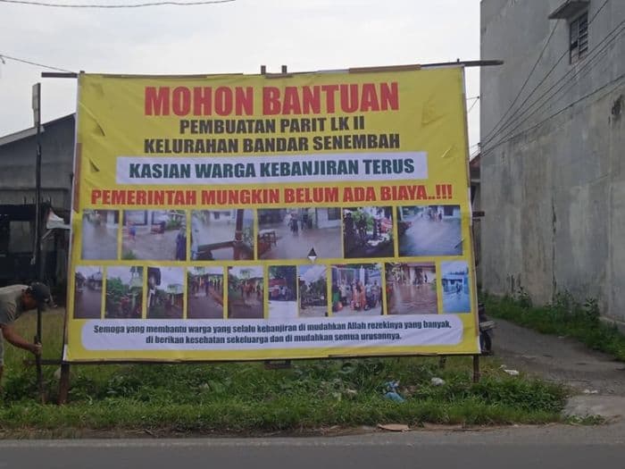 atasi_banjir_warga_binjai_pasang_baliho_open_donasi_untuk_bangun_parit