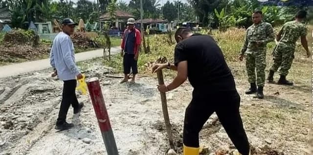 mulai_diukur_pemkab_deli_serdang_pasang_patok_jalan_alternatif_pancur_batu_