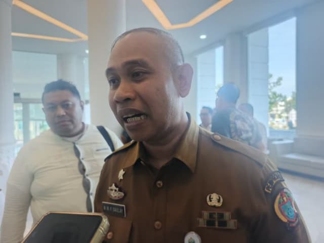 diprotes_pungutan_parkir_dispora_sumut_sebut_sudah_ada_perdanya