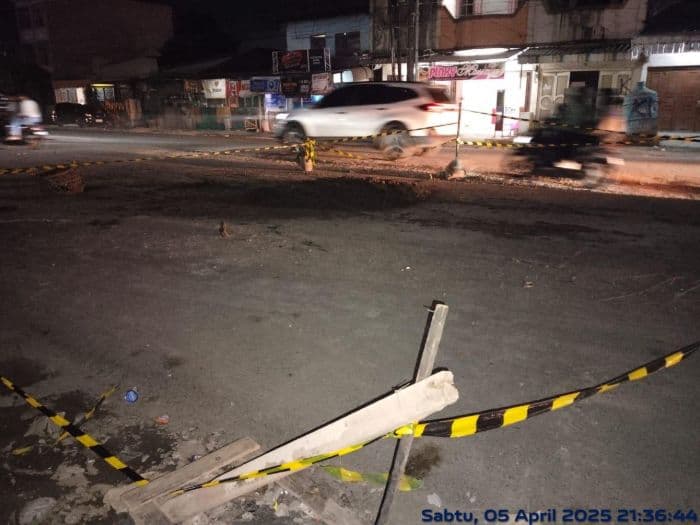 lubang_menganga_di_jalan_tb_simatupang_medan_sudah_ditutup