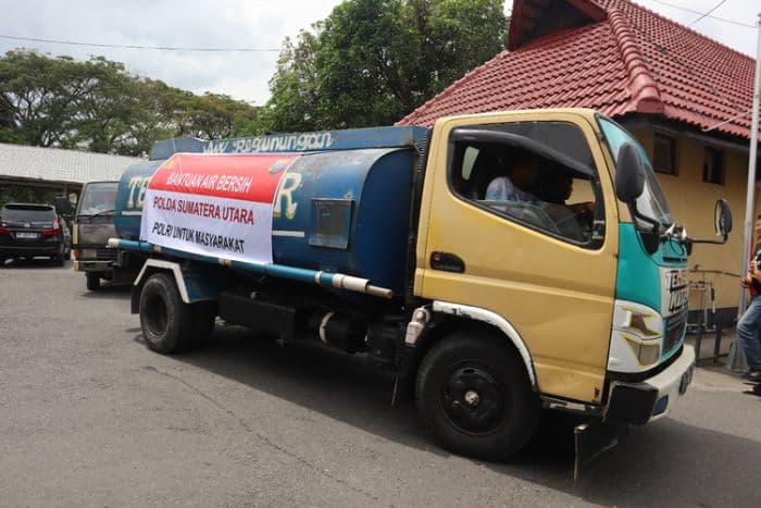 polres_binjai_dan_asahan_kirim_bantuan_untuk_korban_banjir_di_langkat