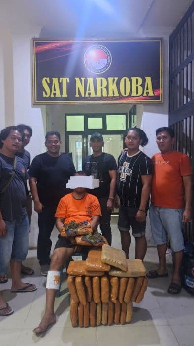 polres_labusel_tangkap_pembawa_26_kg_ganja_di_kotapinang