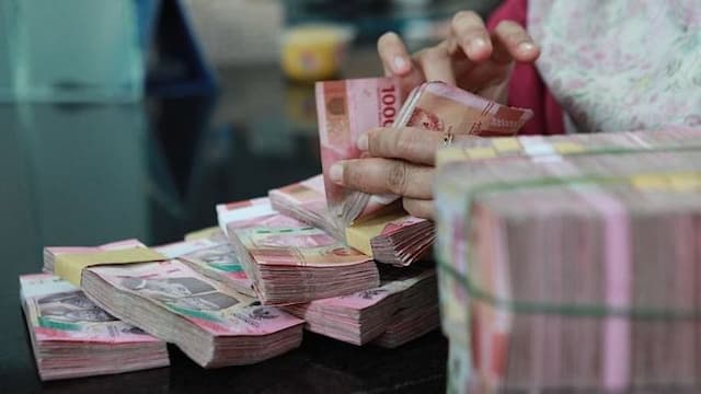 bi_kerek_suku_bunga_acuan_ke_55_persen_rupiah_jadi_rp18050