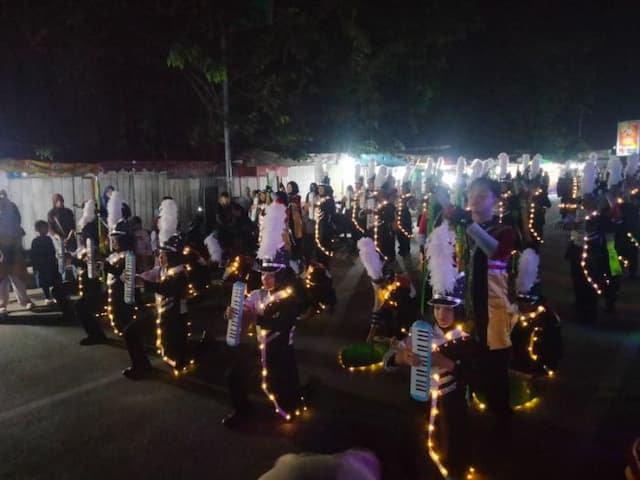 ribuan_warga_padati_kirab_pembukaan_umbc_di_kisaran