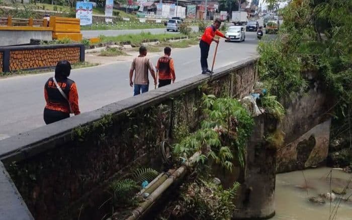 begini_respons_dinas_pu_pematangsiantar_soal_jalan_medan_yang_rawan_banjir
