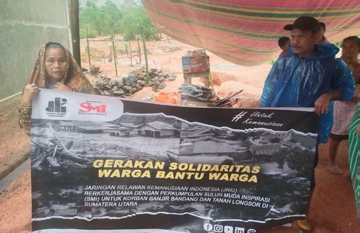 gerakan_warga_bantu_warga_smi_dan_jrk_salurkan_bantuan_korban_banjir_sumut