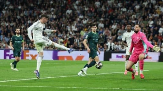 hasil_liga_champions_hatrick_valverde_bawa_real_madrid_sikat_manchester_city_30