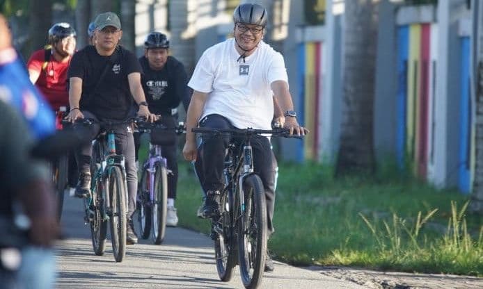 gowes_ke_pasar_kamu_bupati_deli_serdang_ajak_warga_hidup_sehat