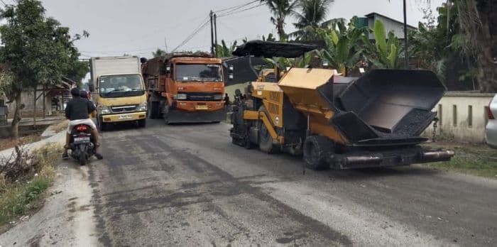 usai_didemo_jalan_sepanjang_455_meter_di_secanggang_akhirnya_diaspal_