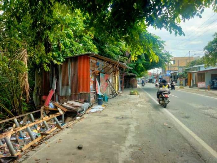 pkl_bongkar_lapak_sendiri_jalan_budi_utomo_kisaran_siap_jadi_dua_jalur