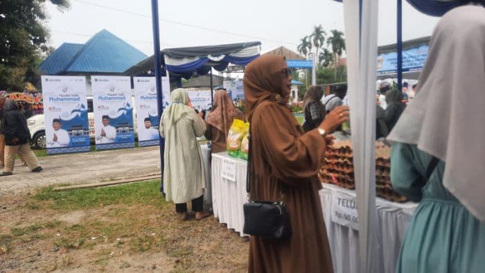 pemkab_simalungun_gelar_pasar_murah_dan_layanan_gratis_di_tapian_dolok