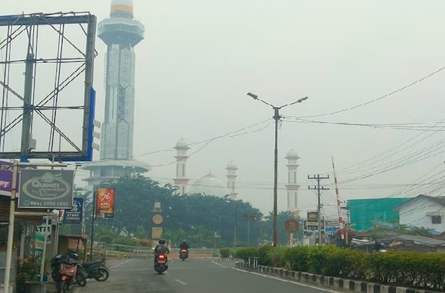 kualitas_udara_di_kisaran_memburuk_dinkes_asahan_imbau_warga_gunakan_masker