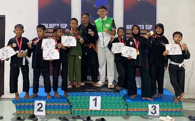 12_medali_diborong_kontingen_pencak_silat_asahan_bersinar_di_piala_wali_kota_tebing_tinggi_2026