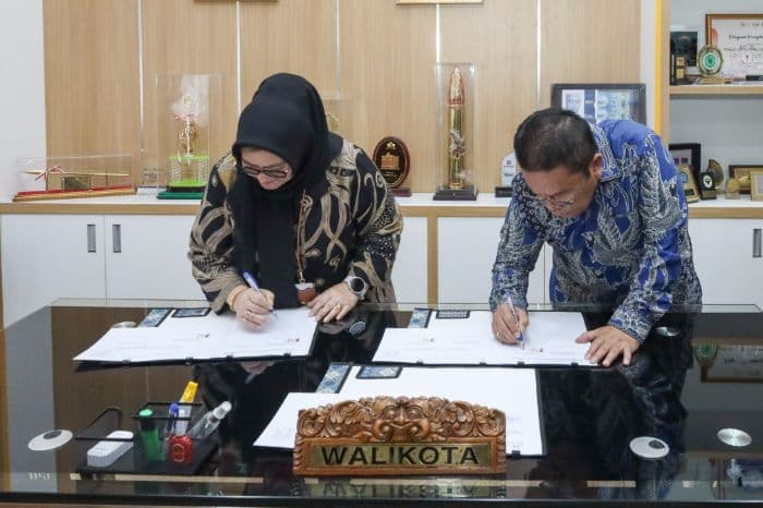 lindungi_ojol_hingga_sopir_angkot_pemko_siantar_resmikan_kerja_sama_dengan_bpjs