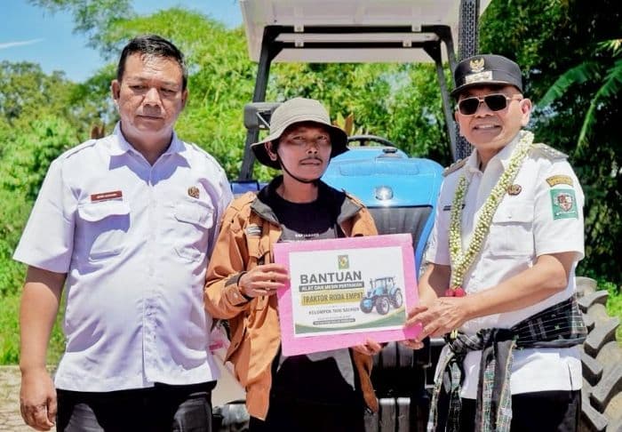 bupati_simalungun_kucurkan_dana_miliaran_untuk_infrastruktur_di_dolog_masagal