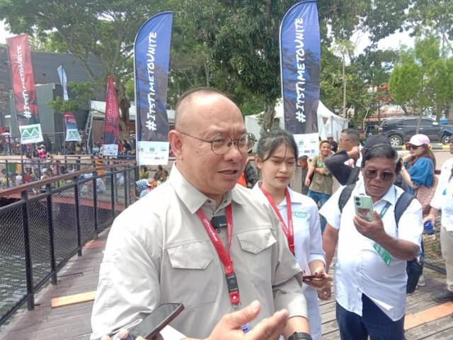 hari_keempat_aquabike_2025_di_balige_ramai_umkm_lokal_mulai_kebanjiran_rezeki