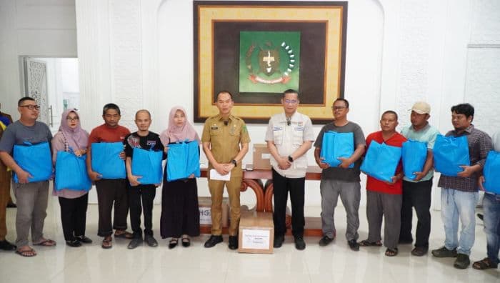 10_ribu_paket_bantuan_disalurkan_untuk_korban_banjir_di_langkat