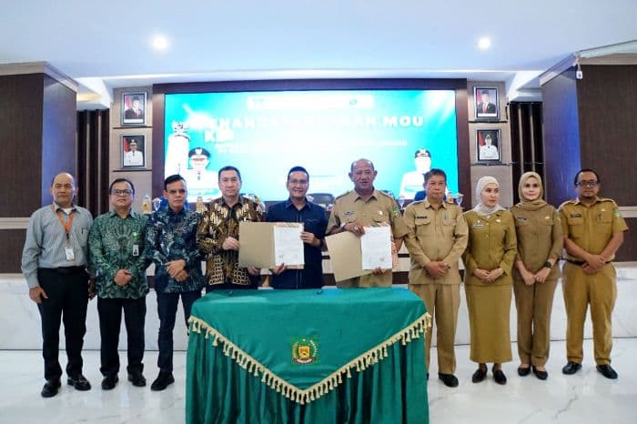 bank_sumut_dan_pemkab_langkat_tandatangani_mou_pengelolaan_keuangan_daerah