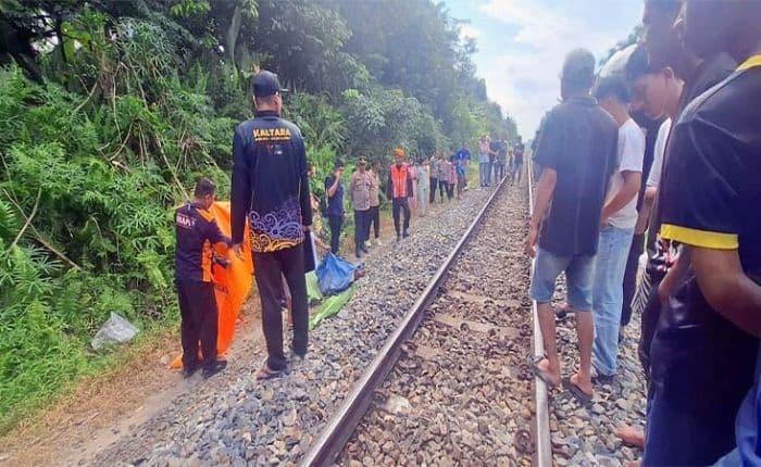 diduga_cekcok_dengan_suami_irt_ditemukan_tewas_di_lintasan_ka_datuk_lima_puluh