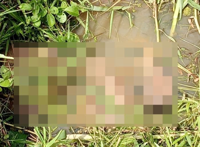 warga_temukan_sosok_mayat_pria_di_selokan_jalan_air_hitam_datuk_lima_puluh_batu_bara