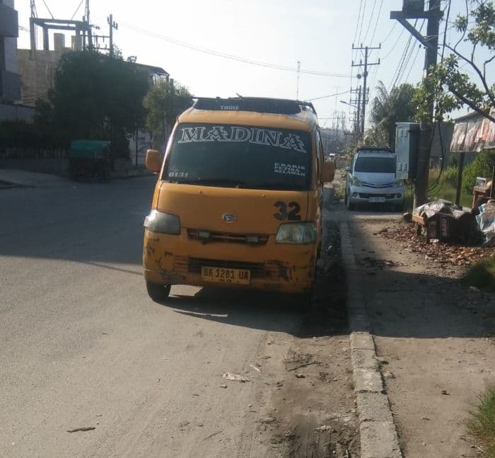 libur_sekolah_pendapatan_sopir_angkot_di_medan_turun_hingga_50_persen