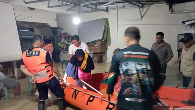 sungai_bingai_meluap_rumah_warga_terendam_banjir