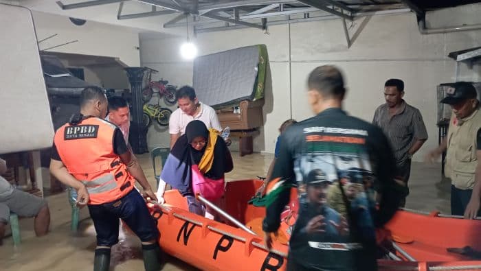 sungai_bingai_meluap_rumah_warga_terendam_banjir