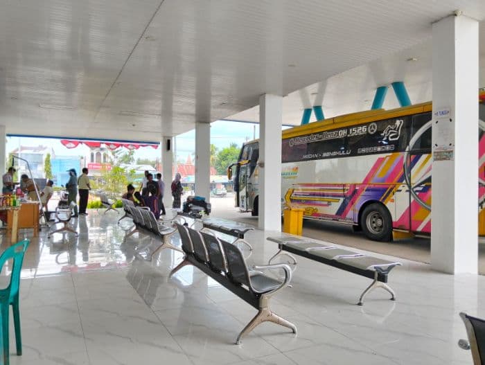 arus_mudik_bus_di_terminal_lubuk_pakam_deli_serdang_masih_sepi_jelang_natal_dan_tahun_baru