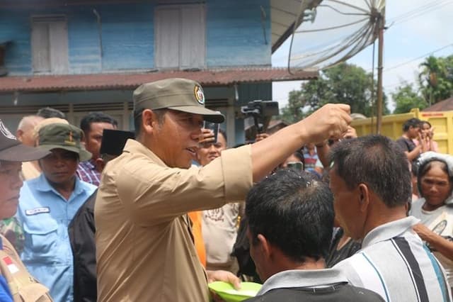 bupati_taput_tinjau_banjir_dan_longsor_di_simangumban_196_rumah_terdampak