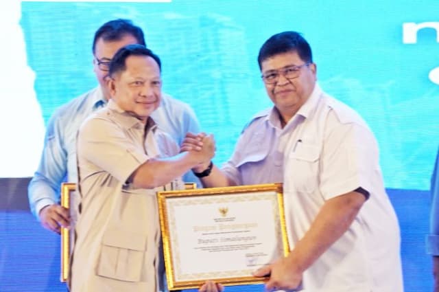 pemkab_simalungun_raih_penghargaan_kemendagri_atas_bantuan_bencana_untuk_aceh_utara