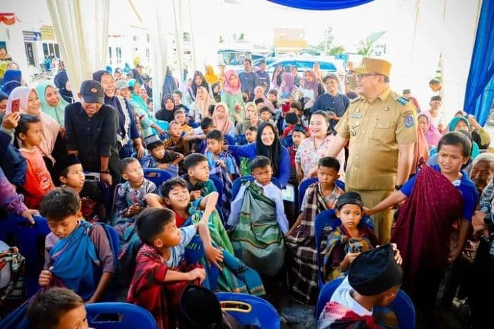 bupati_deli_serdang_hadiri_khitan_massal_dan_santunan_dhuafa_di_percut_sei_tuan
