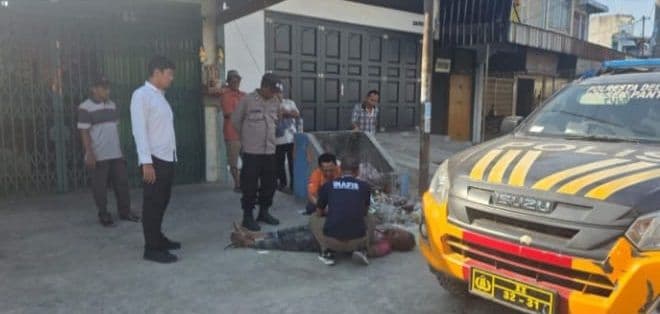 mayat_pria_tanpa_identitas_ditemukan_di_tepi_jalan_pantai_labu_deli_serdang