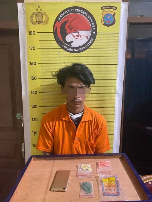 polres_taput_tangkap_bandar_narkoba_sita_114_butir_pil_ekstasi