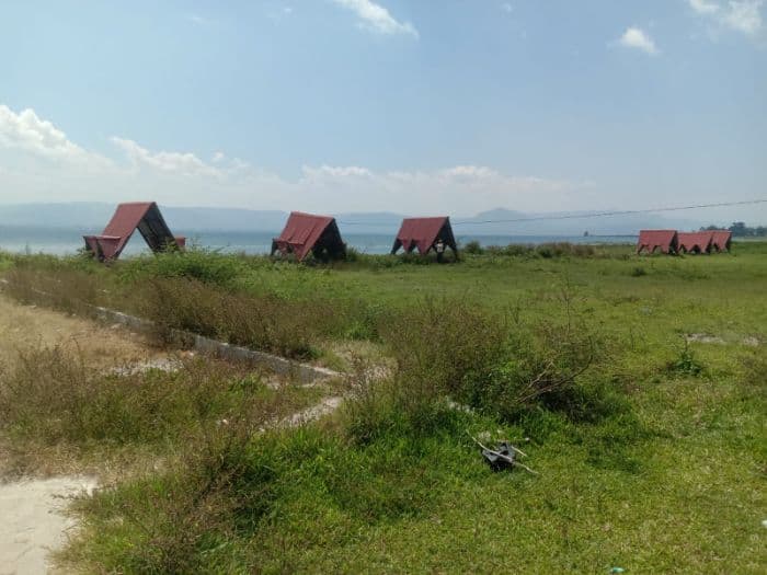 berpotensi_wisata_pantai_godung_di_kecamatan_uluan_toba_telantar_sejak_2019