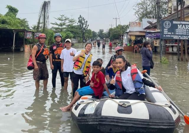 taruna_merah_putih_salurkan_bantuan_banjir_dan_evakuasi_warga_sumut