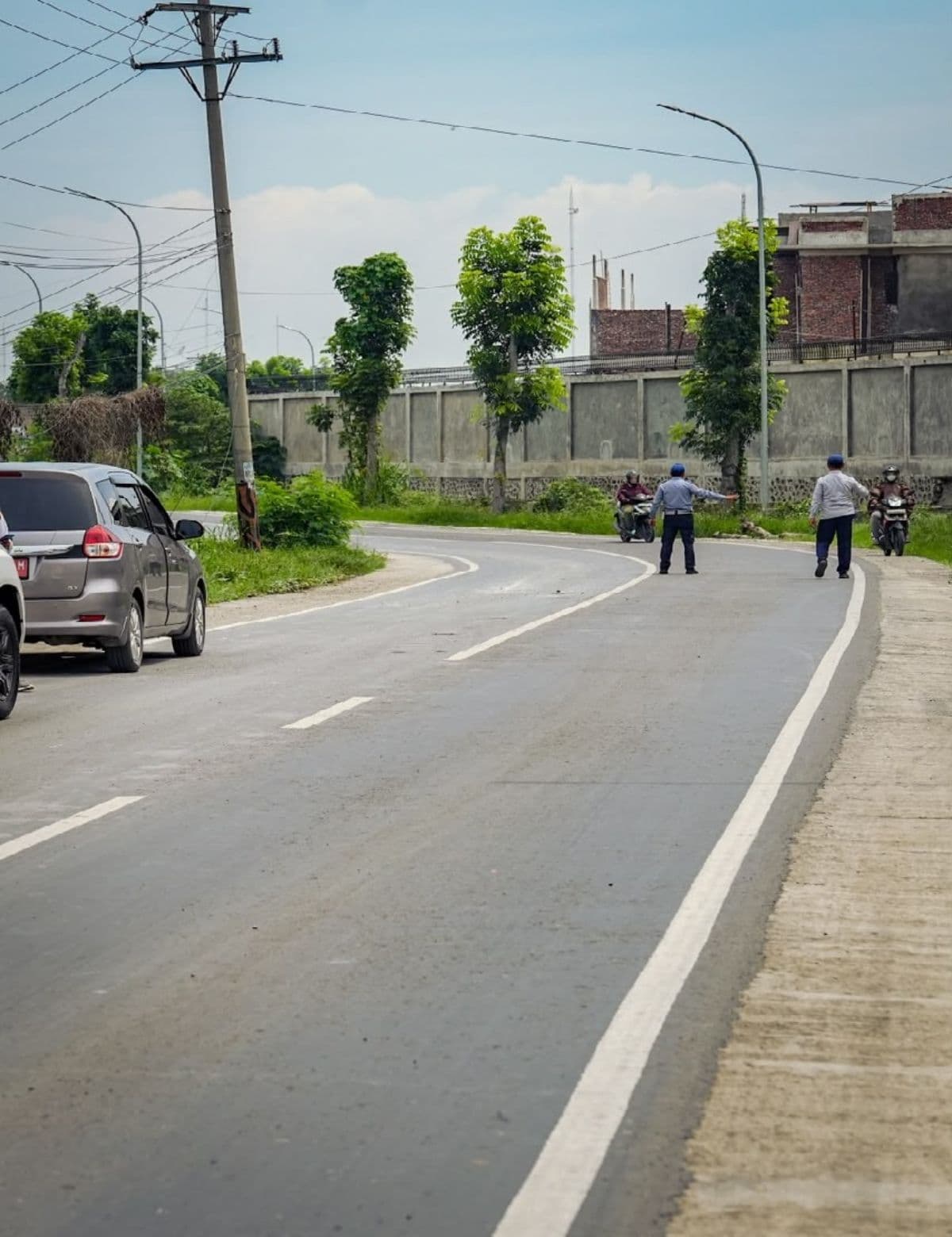 jalan_suasa_sampali_sepanjang_16_km_selesai_diaspal_warga_apresiasi_perbaikan_