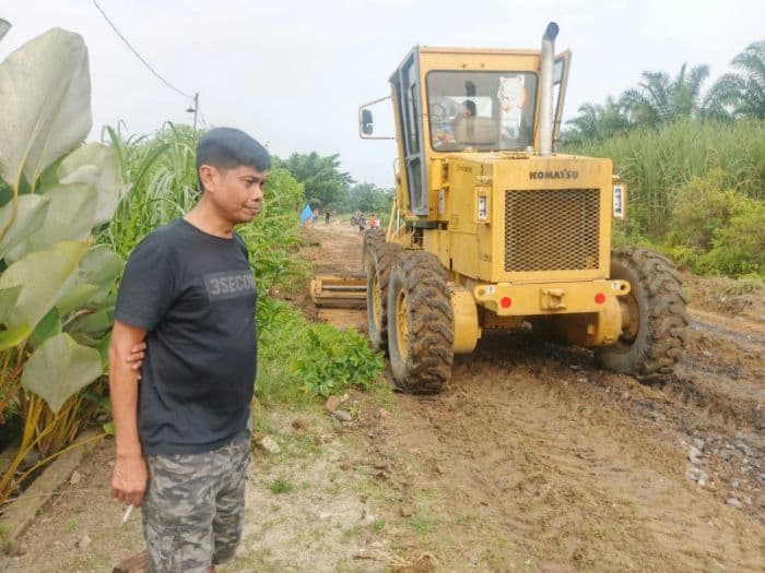 jalan_alternatif_penghubung_kampung_tarutung_iiwonosari_labura_diperbaiki