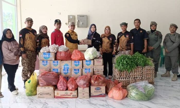 delia_pratiwi_sitepu_salurkan_bantuan_untuk_korban_banjir_di_binjai