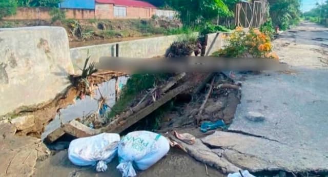 diterjang_luapan_sungai_belumai_jalan_utama_di_dalu_x_b_amblas_dan_terputus
