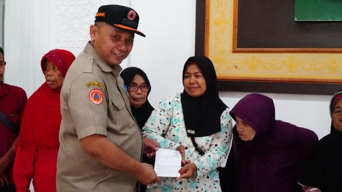239_kk_korban_banjir_langkat_terima_dana_tunggu_hunian